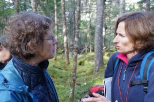 Minga (right) engaged in conversation with soil scientist Elena Ponomarenko at the MTRI Old Forest Conference